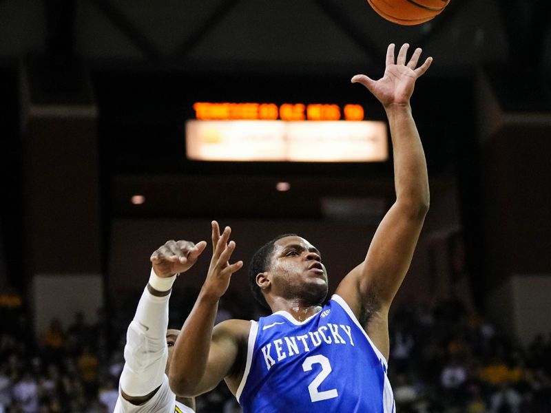 Dec 28, 2022; Columbia, Missouri, USA; Kentucky Wildcats guard Sahvir Wheeler (2) shoots as Missouri Tigers guard D'Moi Hodge (5) defends during the first half at Mizzou Arena. Mandatory Credit: Jay Biggerstaff-USA TODAY Sports