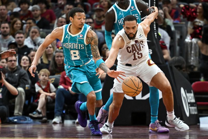 CLEVELAND, OHIO - APRIL 14: Nick Smith Jr. #8 of the Charlotte Hornets steals the ball from Isaiah Mobley #15 of the Cleveland Cavaliers during the second half at Rocket Mortgage Fieldhouse on April 14, 2024 in Cleveland, Ohio. NOTE TO USER: User expressly acknowledges and agrees that, by downloading and or using this photograph, User is consenting to the terms and conditions of the Getty Images License Agreement. (Photo by Nick Cammett/Getty Images)