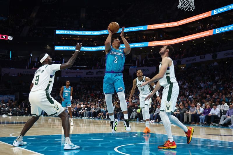 CHARLOTTE, NORTH CAROLINA - FEBRUARY 29: Grant Williams #2 of the Charlotte Hornets attempts a shot during the first half of the game against the Milwaukee Bucks at Spectrum Center on February 29, 2024 in Charlotte, North Carolina. NOTE TO USER: User expressly acknowledges and agrees that, by downloading and or using this photograph, User is consenting to the terms and conditions of the Getty Images License Agreement. (Photo by Jared C. Tilton/Getty Images)