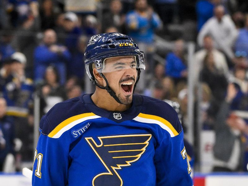 Mar 20, 2025; St. Louis, Missouri, USA;  St. Louis Blues right wing Mathieu Joseph (71) reacts after center Zack Bolduc (not pictured) scored against the Vancouver Canucks during the second period at Enterprise Center. Mandatory Credit: Jeff Curry-Imagn Images