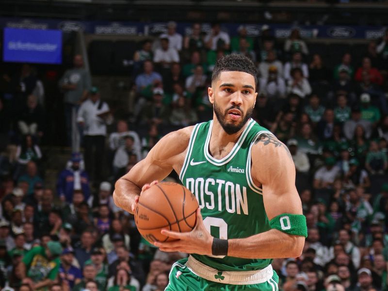 BOSTON, MA - May 7:   Jayson Tatum #0 of the Boston Celtics passes the ball during the game against the New York Knicks  during Round 2 Game 2 of the 2025 NBA Playoffs  on May 7, 2025 at TD Garden in Boston, Massachusetts. NOTE TO USER: User expressly acknowledges and agrees that, by downloading and/or using this Photograph, user is consenting to the terms and conditions of the Getty Images License Agreement. Mandatory Copyright Notice: Copyright 2025 NBAE (Photo by Nathaniel S. Butler/NBAE via Getty Images)