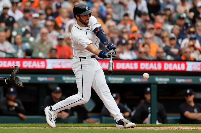 Sep 26, 2024; Detroit, Michigan, USA;  Detroit Tigers center fielder Matt Vierling (8) hits a single in the fourth inning against the Tampa Bay Rays at Comerica Park. Mandatory Credit: Rick Osentoski-Imagn Images