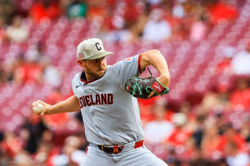 May 16, 2025; Cincinnati, Ohio, USA; Cleveland Guardians starting pitcher Tanner Bibee (28) pitches against the Cincinnati Reds in the first inning at Great American Ball Park. Mandatory Credit: Katie Stratman-Imagn Images