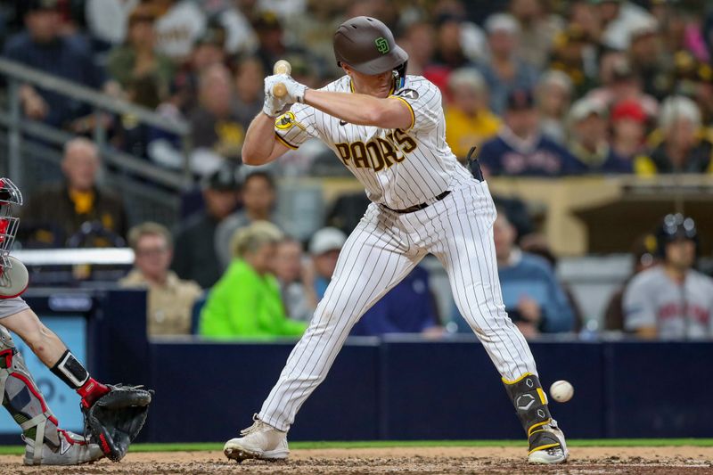 May 20, 2023; San Diego, California, USA; San Diego Padres first baseman Brandon Dixon (16) is hit by a pitch in the fifth inning against the Boston Red Sox at Petco Park. Mandatory Credit: David Frerker-USA TODAY Sports