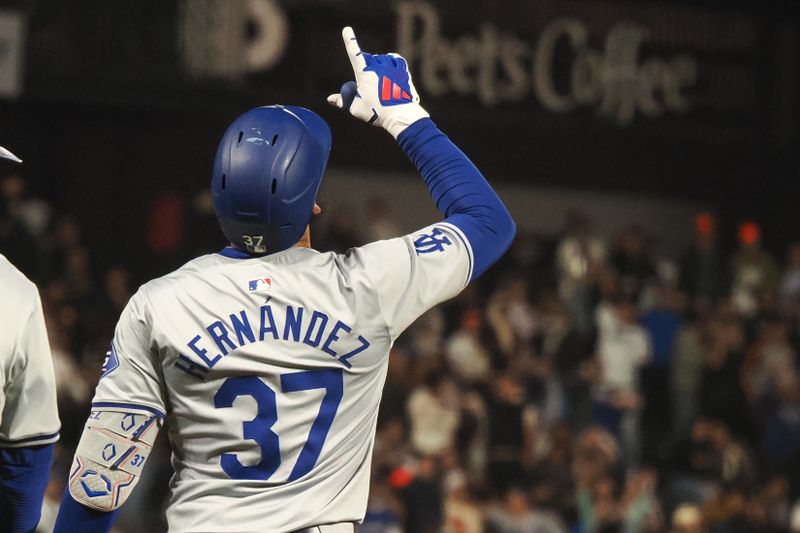 May 14, 2024; San Francisco, California, USA; Los Angeles Dodgers left fielder Teoscar Hernandez (37) celebrates after a two-run RBI triple against the San Francisco Giants during the ninth inning at Oracle Park. Mandatory Credit: Kelley L Cox-USA TODAY Sports