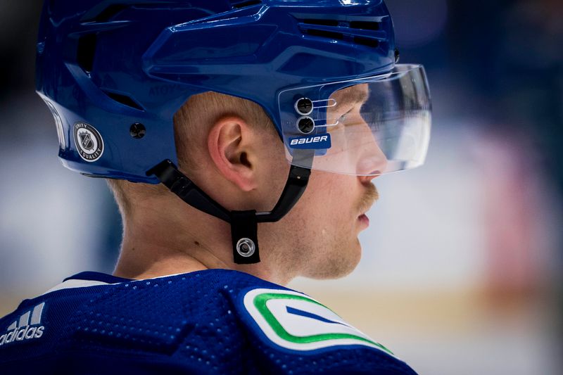 Nov 15, 2023; Vancouver, British Columbia, CAN; Vancouver Canucks forward Elias Pettersson (40) waits to shoot during warm up prior to a game against the New York Islanders at Rogers Arena. Mandatory Credit: Bob Frid-USA TODAY Sports