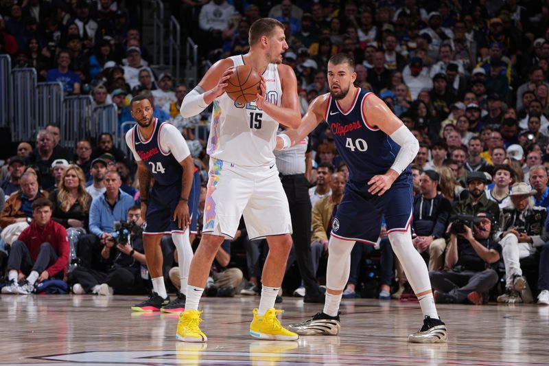 DENVER, CO - APRIL 29: Nikola Jokic #15 of the Denver Nuggets handles the ball during the game against Ivica Zubac #40 of the LA Clippers on April 29, 2025 at Ball Arena in Denver, Colorado. NOTE TO USER: User expressly acknowledges and agrees that, by downloading and/or using this Photograph, user is consenting to the terms and conditions of the Getty Images License Agreement. Mandatory Copyright Notice: Copyright 2025 NBAE (Photo by Garrett Ellwood/NBAE via Getty Images)