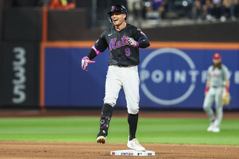 Sep 19, 2024; New York City, New York, USA;  New York Mets left fielder Brandon Nimmo (9) celebrates after hitting an RBI double in the fourth inning against the Philadelphia Phillies at Citi Field. Mandatory Credit: Wendell Cruz-Imagn Images