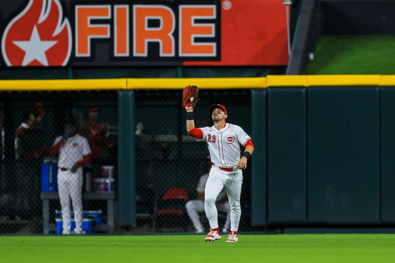 Jun 12, 2024; Cincinnati, Ohio, USA; Cincinnati Reds outfielder TJ Friedl (29) catches a fly out hit by Cleveland Guardians second baseman Andres Gimenez (not pictured) in the seventh inning at Great American Ball Park. Mandatory Credit: Katie Stratman-USA TODAY Sports