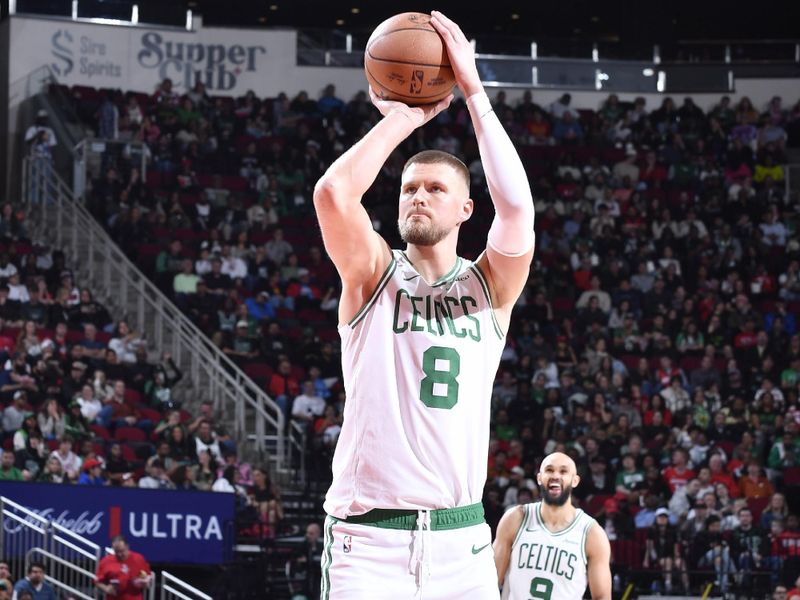 HOUSTON, TX - JANUARY 3:  Kristaps Porzingis #8 of the Boston Celtics shoots the ball during the game against the Houston Rockets on January 3, 2025 at the Toyota Center in Houston, Texas. NOTE TO USER: User expressly acknowledges and agrees that, by downloading and or using this photograph, User is consenting to the terms and conditions of the Getty Images License Agreement. Mandatory Copyright Notice: Copyright 2025 NBAE (Photo by Logan Riely/NBAE via Getty Images)