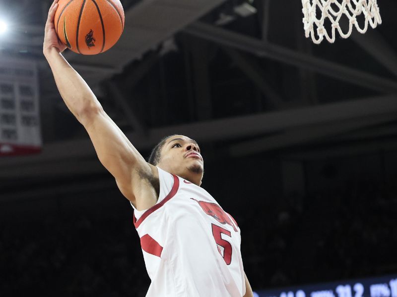 Jan 14, 2026; Fayetteville, Arkansas, USA; Arkansas Razorbacks guard Darius Acuff Jr (5) goes up for a dunk during the first half against the South Carolina Gamecocks at Bud Walton Arena. Mandatory Credit: Nelson Chenault-Imagn Images