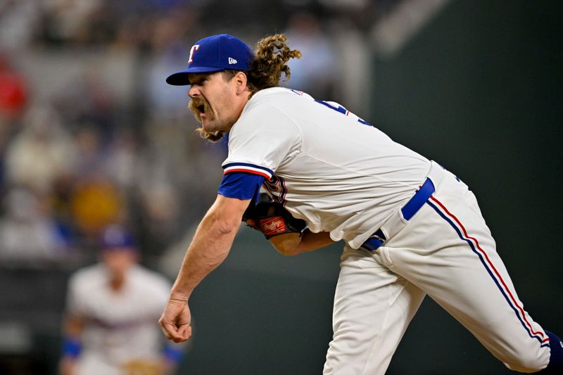 Aug 21, 2024; Arlington, Texas, USA; Texas Rangers relief pitcher Andrew Chafin (59) pitches against the Pittsburgh Pirates during the seventh inning at Globe Life Field. Mandatory Credit: Jerome Miron-USA TODAY Sports
