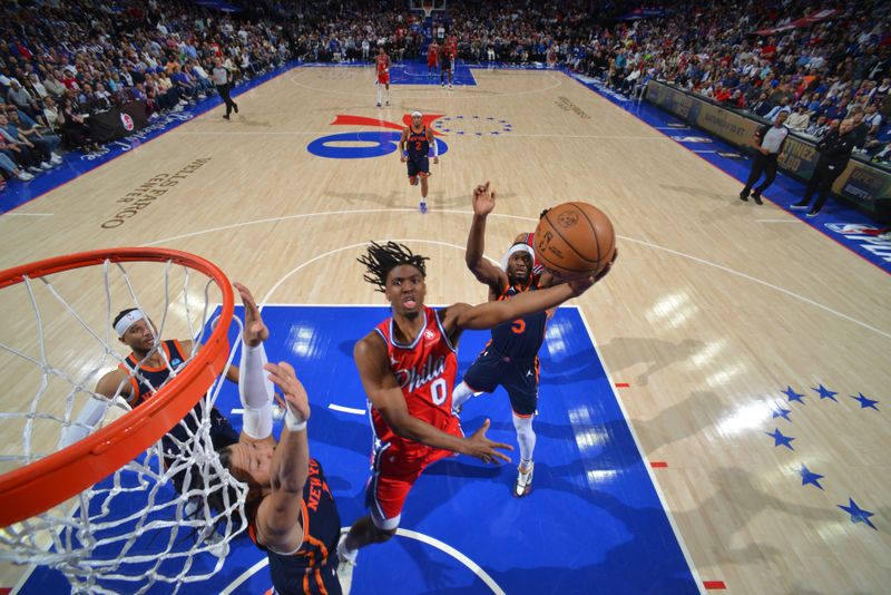 PHILADELPHIA, PA - APRIL 28: Tyrese Maxey #0 of the Philadelphia 76ers drives to the basket during the game against the New York Knicks during Round 1 Game 4 of the 2024 NBA Playoffs on April 28, 2024 at the Wells Fargo Center in Philadelphia, Pennsylvania NOTE TO USER: User expressly acknowledges and agrees that, by downloading and/or using this Photograph, user is consenting to the terms and conditions of the Getty Images License Agreement. Mandatory Copyright Notice: Copyright 2024 NBAE (Photo by Jesse D. Garrabrant/NBAE via Getty Images)