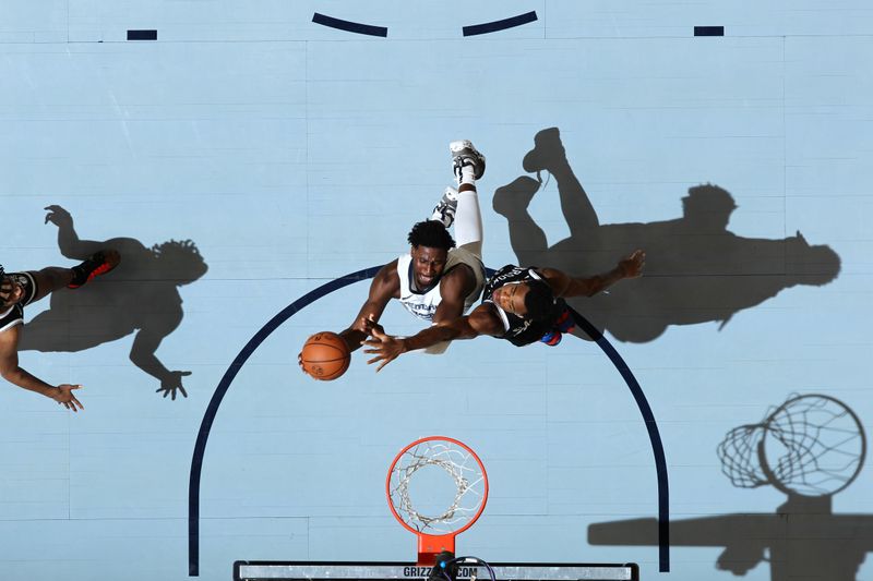 MEMPHIS, TN - February 26:  Jaren Jackson Jr. #13 of the Memphis Grizzlies drives to the basket during the game against the Brooklyn Nets on February 26, 2024 at FedExForum in Memphis, Tennessee. NOTE TO USER: User expressly acknowledges and agrees that, by downloading and or using this photograph, User is consenting to the terms and conditions of the Getty Images License Agreement. Mandatory Copyright Notice: Copyright 2024 NBAE (Photo by Joe Murphy/NBAE via Getty Images)