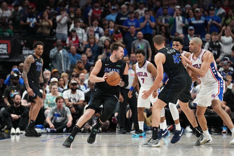 DALLAS, TX - MARCH 3: Luka Doncic #77 of the Dallas Mavericks handles the ball during the game against the Philadelphia 76ers on March 3, 2024 at the American Airlines Center in Dallas, Texas. NOTE TO USER: User expressly acknowledges and agrees that, by downloading and or using this photograph, User is consenting to the terms and conditions of the Getty Images License Agreement. Mandatory Copyright Notice: Copyright 2024 NBAE (Photo by Glenn James/NBAE via Getty Images)