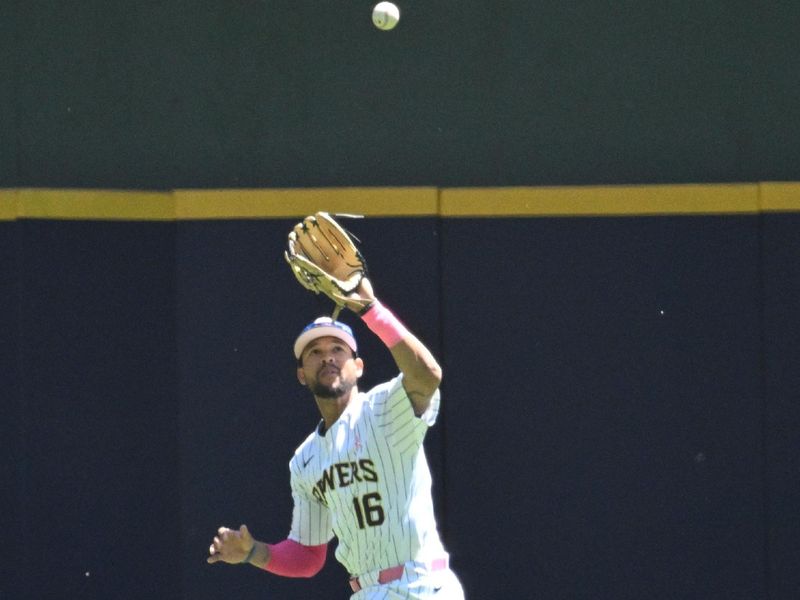 May 12, 2024; Milwaukee, Wisconsin, USA; Milwaukee Brewers outfielder Blake Perkins (16) catches a fly ball against the St. Louis Cardinals in the first inning at American Family Field. Mandatory Credit: Michael McLoone-USA TODAY Sports