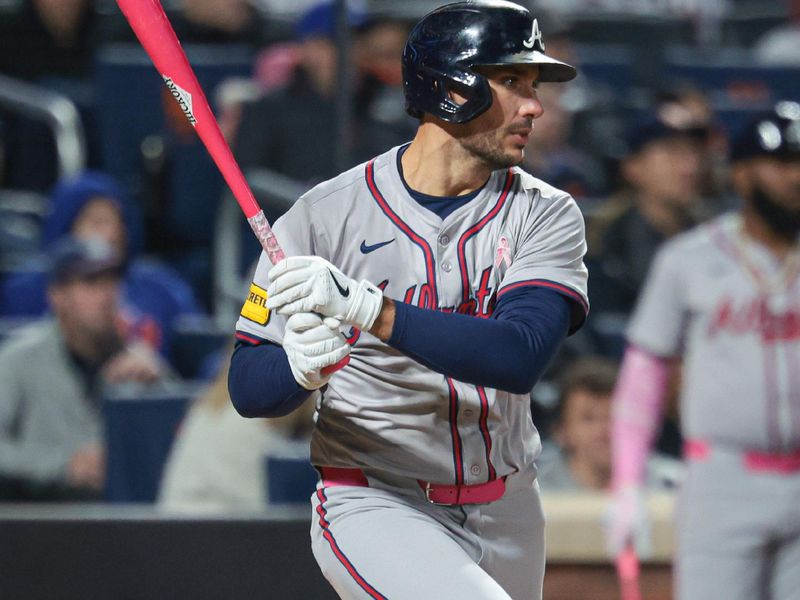 May 12, 2024; New York City, New York, USA; Atlanta Braves first baseman Matt Olson (28) singles during the sixth inning against the New York Mets at Citi Field. Mandatory Credit: Vincent Carchietta-USA TODAY Sports