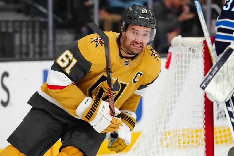 Nov 2, 2023; Las Vegas, Nevada, USA; Vegas Golden Knights right wing Mark Stone (61) skates against the Winnipeg Jets during the third period at T-Mobile Arena. Mandatory Credit: Stephen R. Sylvanie-USA TODAY Sports