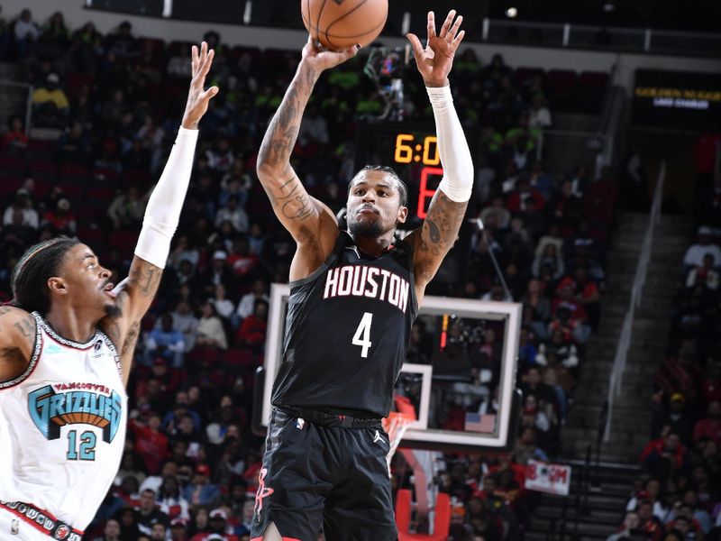 HOUSTON, TX - JANUARY 13: Jalen Green #4 of the Houston Rockets shoots the ball during the game against the Memphis Grizzlies  on January 13, 2025 at the Toyota Center in Houston, Texas. NOTE TO USER: User expressly acknowledges and agrees that, by downloading and or using this photograph, User is consenting to the terms and conditions of the Getty Images License Agreement. Mandatory Copyright Notice: Copyright 2024 NBAE (Photo by Logan Riely/NBAE via Getty Images)