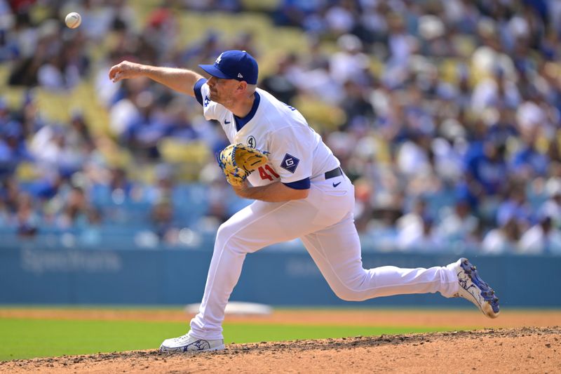 Jun 2, 2024; Los Angeles, California, USA;  Los Angeles Dodgers pitcher Daniel Hudson (41) delivers to the plate in the ninth inning against the Colorado Rockies at Dodger Stadium. Credit: Jayne Kamin-Oncea-USA TODAY Sports