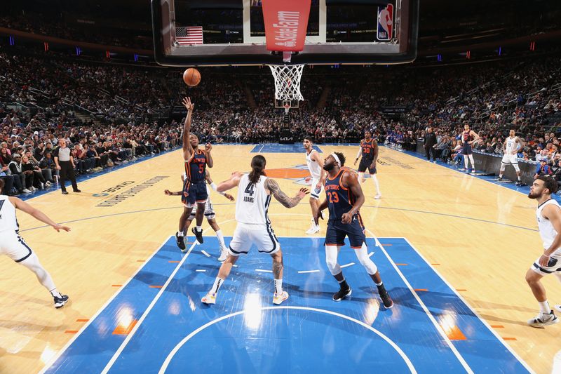 NEW YORK, NY - NOVEMBER 27: Immanuel Quickley #5 of the New York Knicks shoots the ball during the game against the Memphis Grizzlies on November 27, 2022 at Madison Square Garden in New York City, New York.  NOTE TO USER: User expressly acknowledges and agrees that, by downloading and or using this photograph, User is consenting to the terms and conditions of the Getty Images License Agreement. Mandatory Copyright Notice: Copyright 2022 NBAE  (Photo by Nathaniel S. Butler/NBAE via Getty Images)