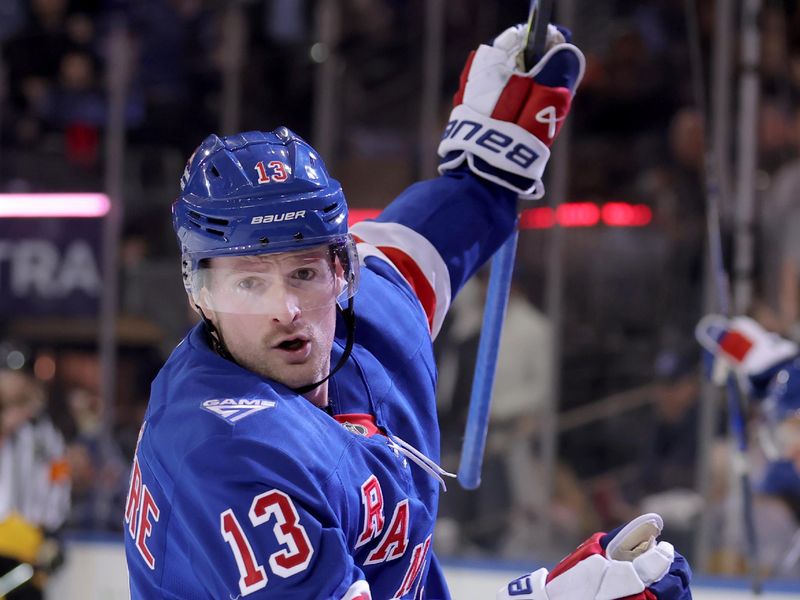 Nov 10, 2025; New York, New York, USA; New York Rangers left wing Alexis Lafreniere (13) celebrates his goal against the Nashville Predators during the second period at Madison Square Garden. Mandatory Credit: Brad Penner-Imagn Images