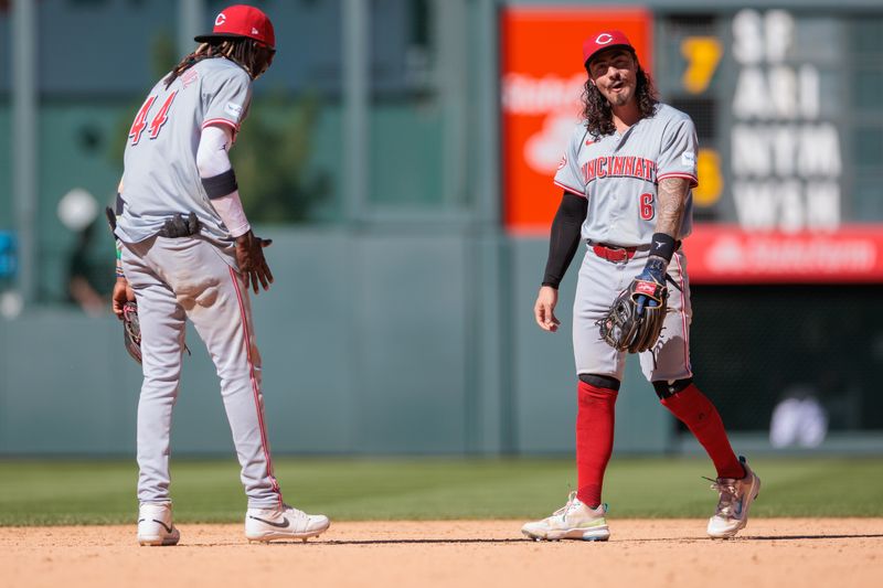 Jun 5, 2024; Denver, Colorado, USA; Cincinnati Reds shortstop Elly De La Cruz (44) and second base Jonathan India (6) celebrate after winning against the Colorado Rockies at Coors Field. Mandatory Credit: Andrew Wevers-USA TODAY Sports