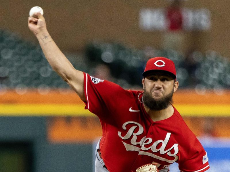Sep 13, 2023; Detroit, Michigan, USA; Cincinnati Reds relief pitcher Daniel Duarte (77) throws in the eighth inning against the Detroit Tigers at Comerica Park. Mandatory Credit: David Reginek-USA TODAY Sports