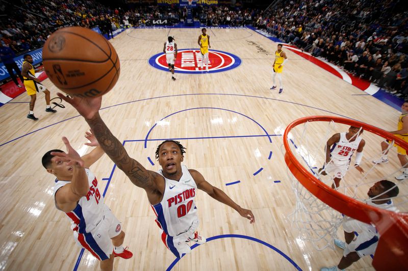 DETROIT, MI - OCTOBER 23: Ron Holland II #00 of the Detroit Pistons grabs the rebound during the game against the Indiana Pacers on October 23, 2024 at Little Caesars Arena in Detroit, Michigan. NOTE TO USER: User expressly acknowledges and agrees that, by downloading and/or using this photograph, User is consenting to the terms and conditions of the Getty Images License Agreement. Mandatory Copyright Notice: Copyright 2024 NBAE (Photo by Brian Sevald/NBAE via Getty Images)