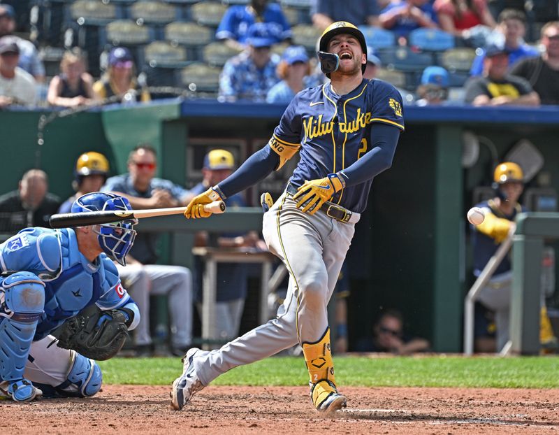 May 8, 2024; Kansas City, Missouri, USA;  Milwaukee Brewers second baseman Brice Turang (2) reacts after fouling a ball off his leg in the ninth inning against the Kansas City Royals at Kauffman Stadium. Mandatory Credit: Peter Aiken-USA TODAY Sports