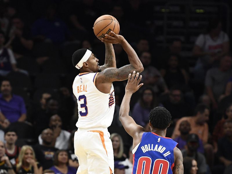 PHOENIX, ARIZONA - OCTOBER 11: Bradley Beal #3 of the Phoenix Suns attempts a shot against Ronald Holland II #00 of the Detroit Pistons during the first half of the preseason game at Footprint Center on October 11, 2024 in Phoenix, Arizona.  NOTE TO USER: User expressly acknowledges and agrees that, by downloading and/or using this photograph, user is consenting to the terms and conditions of the Getty Images License Agreement. (Photo by Kelsey Grant/Getty Images)