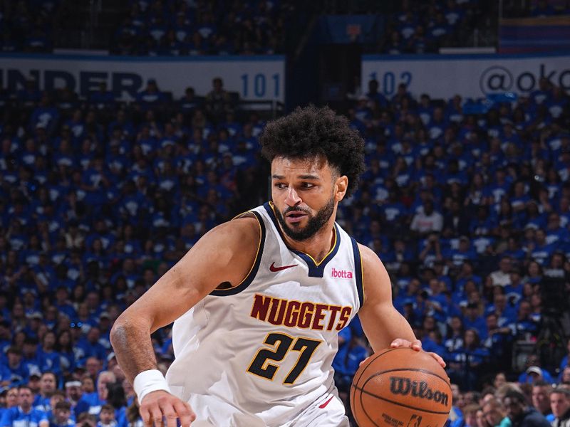 OKLAHOMA CITY, OK - MAY 18: Jamal Murray #27 of the Denver Nuggets handles the ball during the game against the Oklahoma City Thunder during Round 2 Game 7 of the 2025 NBA Playoffs on May 18, 2025 at Paycom Center in Oklahoma City, Oklahoma. NOTE TO USER: User expressly acknowledges and agrees that, by downloading and or using this photograph, User is consenting to the terms and conditions of the Getty Images License Agreement. Mandatory Copyright Notice: Copyright 2025 NBAE(Photo by Garrett Ellwood/NBAE via Getty Images)