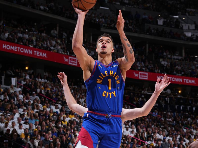 DENVER, CO - APRIL 20: Michael Porter Jr. #1 of the Denver Nuggets drives to the basket during the game against the Los Angeles Lakers during Round 1 Game 1 of the 2024 NBA Playoffs on April 20, 2024 at the Ball Arena in Denver, Colorado. NOTE TO USER: User expressly acknowledges and agrees that, by downloading and/or using this Photograph, user is consenting to the terms and conditions of the Getty Images License Agreement. Mandatory Copyright Notice: Copyright 2024 NBAE (Photo by Garrett Ellwood/NBAE via Getty Images)