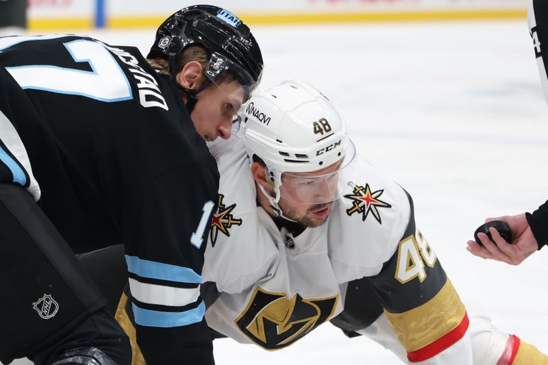 Nov 15, 2024; Salt Lake City, Utah, USA; Utah Hockey Club center Nick Bjugstad (17) and Vegas Golden Knights center Tomas Hertl (48) prepare to face-off during the third period at Delta Center. Mandatory Credit: Rob Gray-Imagn Images