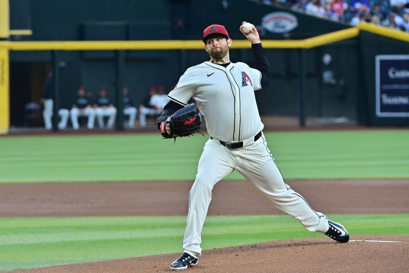 May 1, 2024; Phoenix, Arizona, USA;  Arizona Diamondbacks pitcher Jordan Montgomery (52) throws in the first inning against the Los Angeles Dodgers at Chase Field. Mandatory Credit: Matt Kartozian-USA TODAY Sports