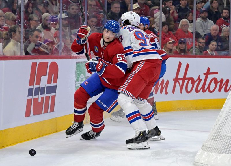Oct 18, 2025; Montreal, Quebec, CAN; New York Rangers forward Mika Zibanejad (93) forechecks Montreal Canadiens defenseman Noah Dobson (53) during the first period at the Bell Centre. Mandatory Credit: Eric Bolte-Imagn Images
