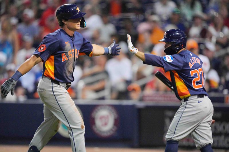 Mar 14, 2024; West Palm Beach, Florida, USA; Houston Astros center fielder Jake Meyers (6) is congratulated by second baseman Jose Altuve (27) after hitting a solo home run in the sixth inning against the Washington Nationals at CACTI Park of the Palm Beaches. Mandatory Credit: Jim Rassol-USA TODAY Sports