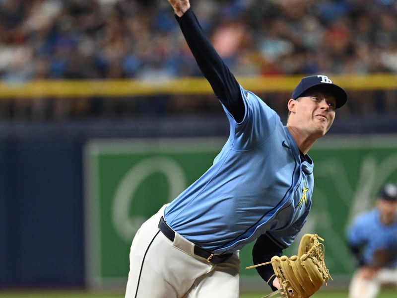 Jul 28, 2024; St. Petersburg, Florida, USA; Tampa Bay Rays relief pitcher Pete Fairbanks (29) throws a pitch in the ninth inning against the Cincinnati Reds at Tropicana Field. Mandatory Credit: Jonathan Dyer-USA TODAY Sports