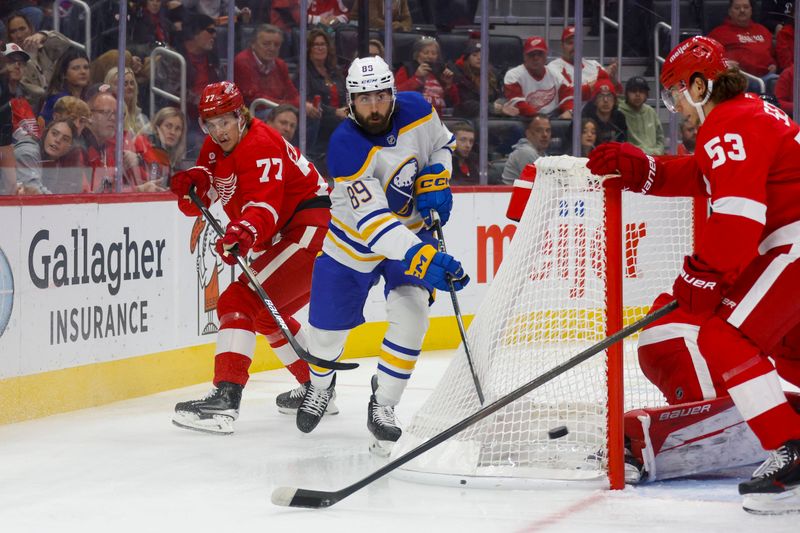 Nov 2, 2024; Detroit, Michigan, USA; Buffalo Sabres right wing Alex Tuch (89) passes the puck during the first period of the game against the Detroit Red Wings at Little Caesars Arena. Mandatory Credit: Brian Bradshaw Sevald-Imagn Images