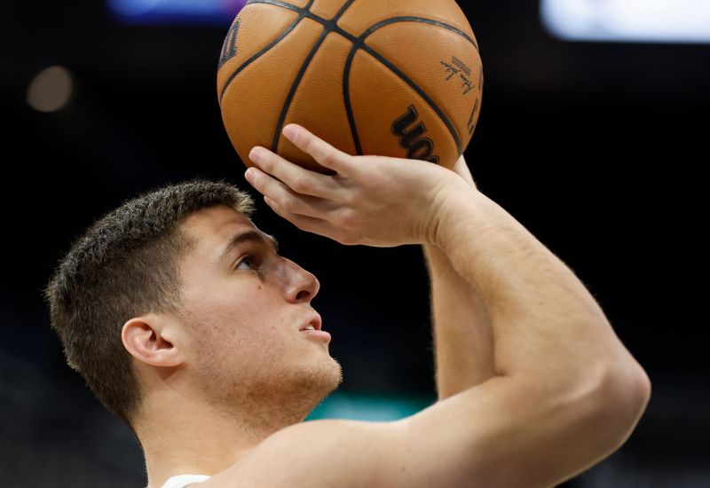 SAN ANTONIO, TX - MARCH 15: Collin Gillespie #21 of the Denver Nuggets takes warm upshots before the game against the San Antonio Spurs at Frost Bank Center on March 15, 2024 in San Antonio, Texas. NOTE TO USER: User expressly acknowledges and agrees that, by downloading and or using this photograph, User is consenting to terms and conditions of the Getty Images License Agreement. (Photo by Ronald Cortes/Getty Images)