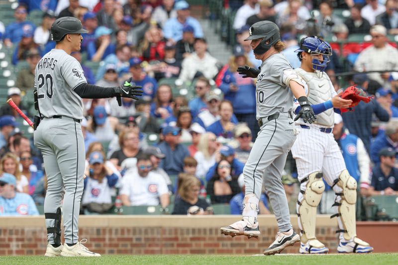 May 17, 2025; Chicago, Illinois, USA; Chicago White Sox shortstop Chase Meidroth (10) crosses home plate after hitting a solo home run against the Chicago Cubs during the first inning at Wrigley Field. Mandatory Credit: Kamil Krzaczynski-Imagn Images