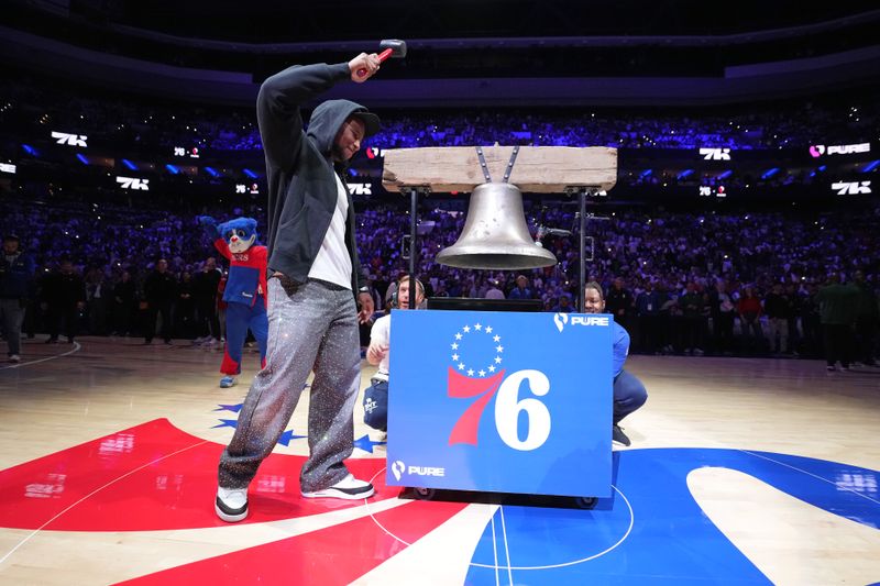 PHILADELPHIA, PA - OCTOBER 22: Saquon Barkley rings the bell before the Philadelphia 76ers and Milwaukee Bucks game on October 22, 2024 at the Wells Fargo Center in Philadelphia, Pennsylvania NOTE TO USER: User expressly acknowledges and agrees that, by downloading and/or using this Photograph, user is consenting to the terms and conditions of the Getty Images License Agreement. Mandatory Copyright Notice: Copyright 2024 NBAE (Photo by Jesse D. Garrabrant/NBAE via Getty Images)