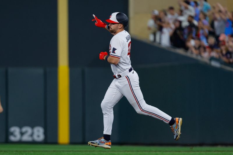 Aug 25, 2023; Minneapolis, Minnesota, USA; Minnesota Twins designated hitter Edouard Julien (47) runs the bases on his three-run home run against the Texas Rangers in the seventh inning at Target Field. Mandatory Credit: Bruce Kluckhohn-USA TODAY Sports