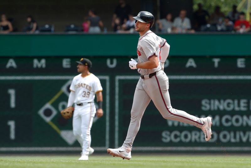 May 26, 2024; Pittsburgh, Pennsylvania, USA;  Atlanta Braves first baseman Matt Olson (28) circles the bases on a solo home run against the Pittsburgh Pirates during the eighth inning at PNC Park. Atlanta won 8-1. Mandatory Credit: Charles LeClaire-USA TODAY Sports