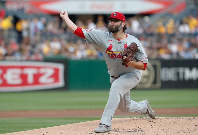 Jul 23, 2024; Pittsburgh, Pennsylvania, USA; St. Louis Cardinals starting pitcher Lance Lynn (31) delivers a pitch against the Pittsburgh Pirates during the first inning at PNC Park. Mandatory Credit: Charles LeClaire-USA TODAY Sports