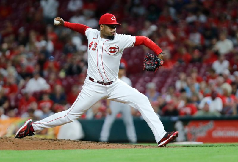 Aug 7, 2023; Cincinnati, Ohio, USA; Cincinnati Reds relief pitcher Alexis Diaz (43) throws against the Miami Marlins during the ninth inning at Great American Ball Park. Mandatory Credit: David Kohl-USA TODAY Sports