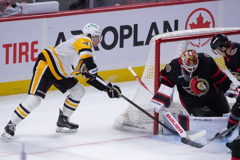 Dec 18, 2025; Ottawa, Ontario, CAN; Pittsburgh Penguins left wing Danton Heinen (43) shoots on Ottawa Senators goalie Linus Ullmark (35) in the third period at the Canadian Tire Centre. Mandatory Credit: Marc DesRosiers-IMAGN Images