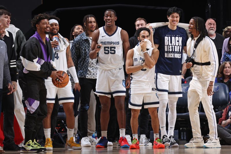 MEMPHIS, TN - FEBRUARY 15: The Memphis Grizzlies bench smile during the game against the Milwaukee Bucks on February 15, 2024 at FedExForum in Memphis, Tennessee. NOTE TO USER: User expressly acknowledges and agrees that, by downloading and or using this photograph, User is consenting to the terms and conditions of the Getty Images License Agreement. Mandatory Copyright Notice: Copyright 2024 NBAE (Photo by Stephen Gosling/NBAE via Getty Images)