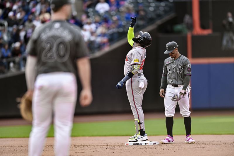 May 11, 2024; New York City, New York, USA; Atlanta Braves designated hitter Marcell Ozuna (20) reacts after hitting a double against the New York Mets during the ninth inning at Citi Field. Mandatory Credit: John Jones-USA TODAY Sports