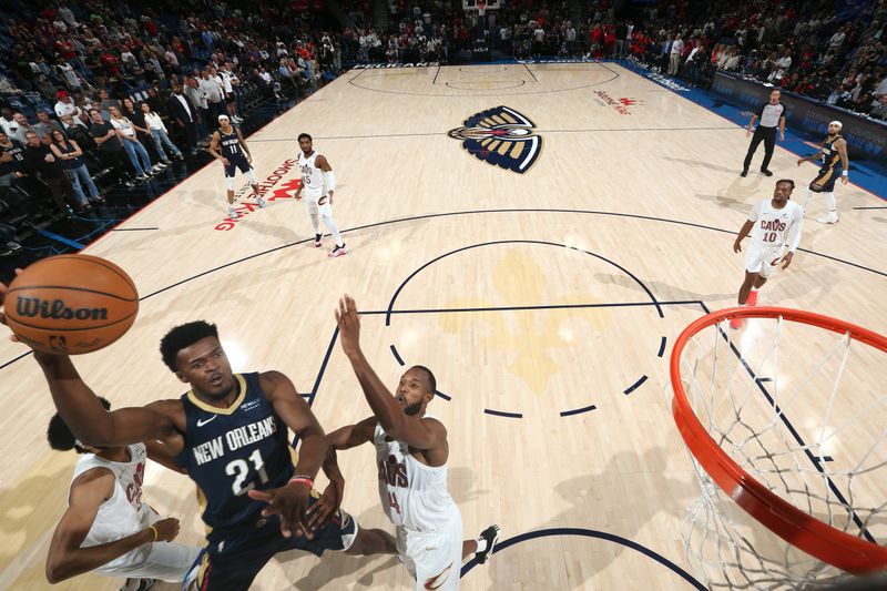 NEW ORLEANS, LA - NOVEMBER 6: Yves Missi #21 of the New Orleans Pelicans dunks the ball during the game against the Cleveland Cavaliers on November 6, 2024 at the Smoothie King Center in New Orleans, Louisiana. NOTE TO USER: User expressly acknowledges and agrees that, by downloading and or using this Photograph, user is consenting to the terms and conditions of the Getty Images License Agreement. Mandatory Copyright Notice: Copyright 2024 NBAE (Photo by Layne Murdoch Jr./NBAE via Getty Images)